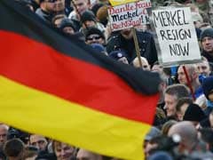 Thousands At Far-Right Rally Against Angela Merkel Migrant Policy