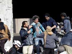 Air Strike Kills Dozens In Syria As UN Envoy Visits Damascus