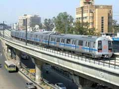 Man Obstructs Delhi Metro's Run By Walking On Track