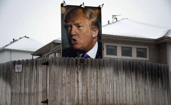 Giant Donald Trump Poster Becomes Pilgrimage Site