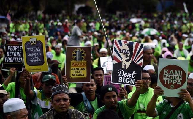 Protesters Hit The Streets To Oppose Malaysia Signing Pacific Deal