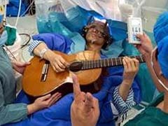 Strumming My Pain...Patient Plays Guitar During Brain Surgery