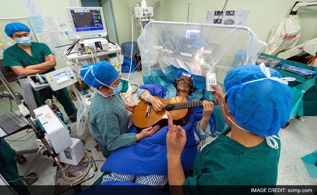 Strumming My Pain...Patient Plays Guitar During Brain Surgery