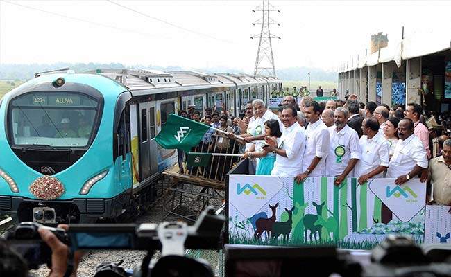 Kerala Chief Minister Oommen Chandy Flags Off First Trial Run Of Kochi Metro