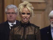 Pamela Anderson Ruffles French Feathers Over Foie Gras Crusade