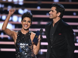 When John Stamos Interrupted Priyanka Chopra's People's Choice Speech When John Stamos Interrupted Priyanka Chopra's People's Choice Speech