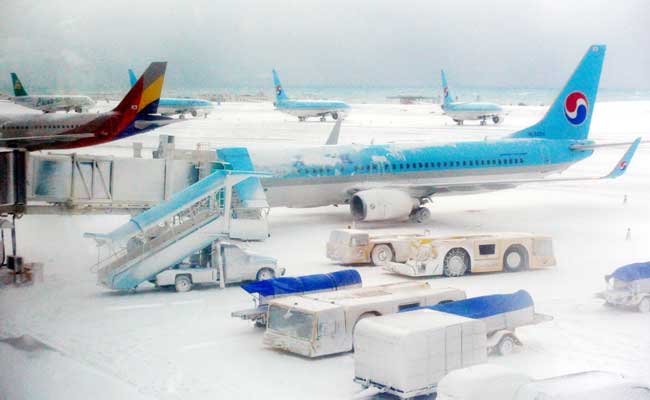 Snow Shutters Airport On South Korean Resort Island Jeju