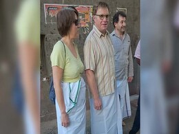 Foreigners Wrap Dhotis Over Jeans, Skirts To Enter Tamil Nadu Temples Foreigners Wrap Dhotis Over Jeans, Skirts To Enter Tamil Nadu Temples