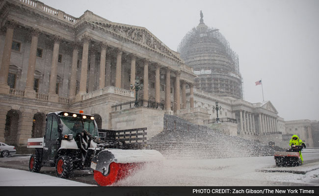 Dire Warnings Along East Coast As Snow Piles Up