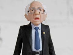 Bernie Sanders Action Toy Slouches, Points And Raises Lots Of Cash