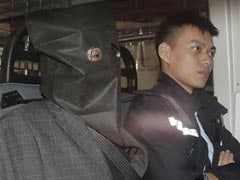 Chinese Double Murder Suspect Held In Hong Kong Says He Is Unwell