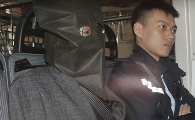 Chinese Double Murder Suspect Held In Hong Kong Says He Is Unwell