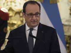 Crisis-Hit French Farmers Heckle Francois Hollande As He Opens Farm Export