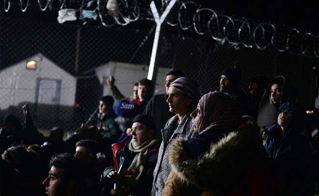Thousands Of Migrants Flee As Fire Damages Greek Camp