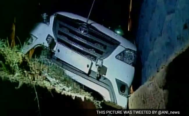 Oommen Chandy Escapes Unhurt After His Car Skids And Falls Into Drain