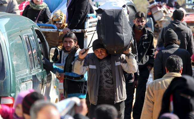 On Turkish Side Of Border, Syrian Refugees Wait And Worry