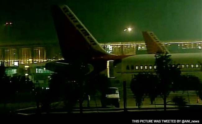 Air India Passengers Slide Down Emergency Chute After Tyre Burst