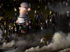 Police Fire Tear Gas At Protests Against Brazil's President