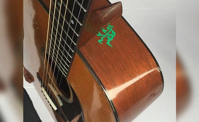 Please Forgive Me? Egypt Customs Deface Bryan Adams' Guitar