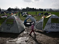 Mud-Soaked Migrants Fight For Food As Greek Border Blockade Drags On