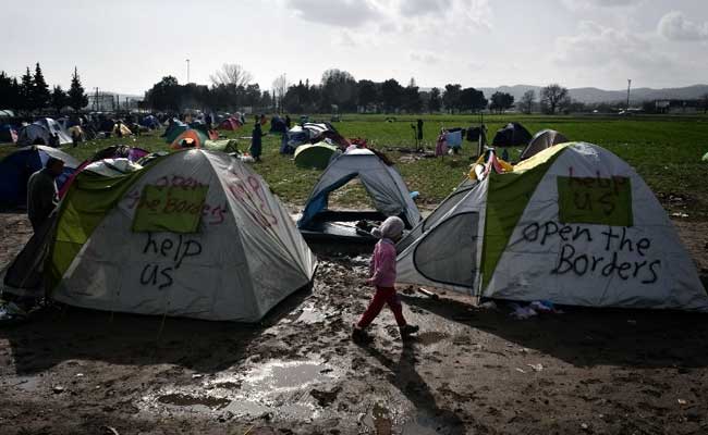 Mud-Soaked Migrants Fight For Food As Greek Border Blockade Drags On