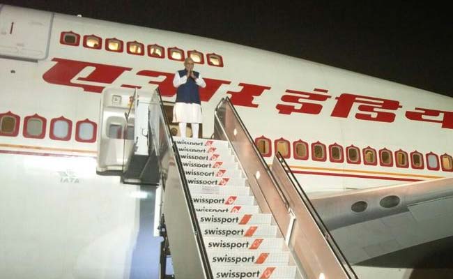 A New Look For PM Modi's Air India One Crew: Khadi Saris, Bandhgalas