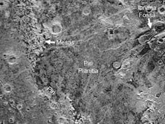 Scientists Find Giant 'Bite Mark' On Pluto's Surface