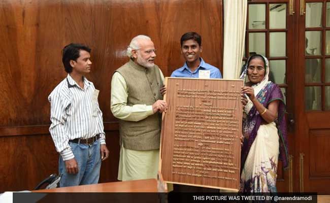 Kanpur Carpenter Gifts Gita Carved In Wood To PM Modi