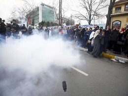 Turkish Police Fire Tear Gas For Second Day After Seizing Newspaper Turkish Police Fire Tear Gas For Second Day After Seizing Newspaper