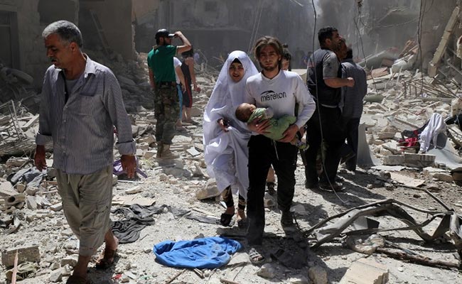 Residents Flee As Air Strikes Shake Syria's Aleppo