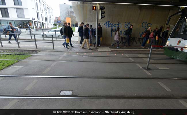 This City Embedded Traffic Lights In The Sidewalks So That Smartphone Users Don't Have To Look Up