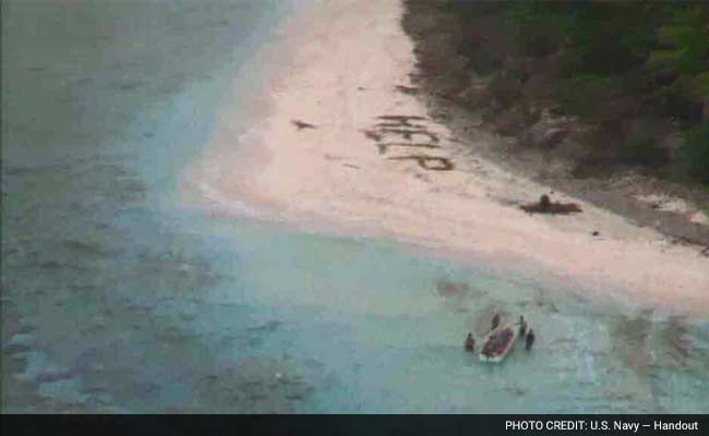 Three Men Rescued From Remote Island After Writing 'Help' On The Sand