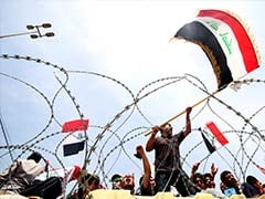 Hundreds Of Protesters Storm Baghdad's Green Zone, Enter Parliament