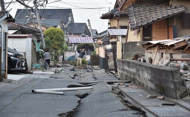 Japan Earthquakes Kill At Least 32; Rescuers Rush To Free Trapped