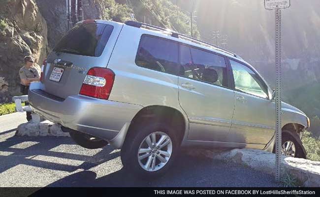 Man Escapes Car Dangling On Cliff - Only To Be Hit By Bus