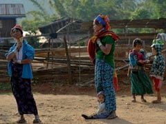 Myanmar's 'Long-Necked' Women Hope To Turn Tourism Into Homecoming