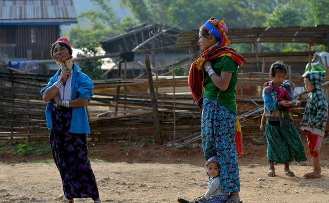 Myanmar's 'Long-Necked' Women Hope To Turn Tourism Into Homecoming
