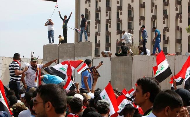 State Of Emergency Declared In Baghdad As Protesters Take Iraqi Parliament