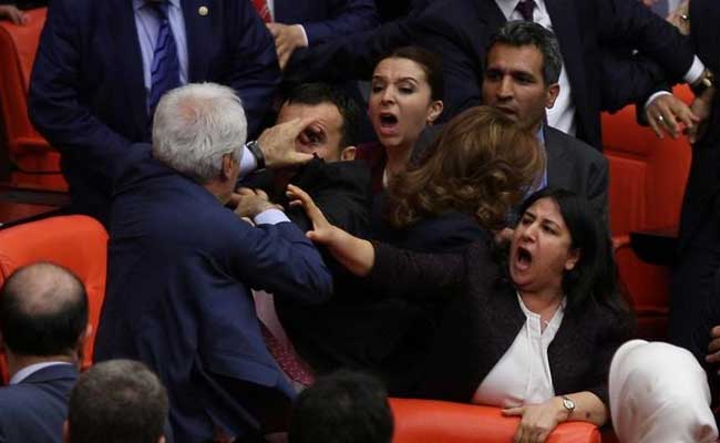 Brawls In Turkish Parliament Delay Legislation On Migrant Deal