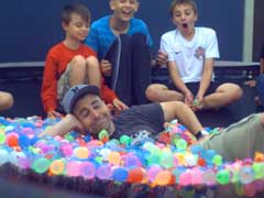 Video Shows Kids Jumping on Trampoline With 1500 Water Balloons on it