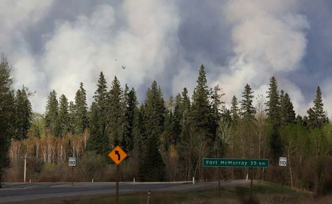 Airlift For 8,000 Canada Wildfire Evacuees