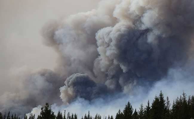 Canada Fire 'Out Of Control,' Doubles In Size