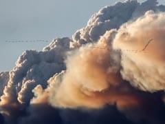 Helicopters Lead Convoy Through Fire-Ravaged Canadian City