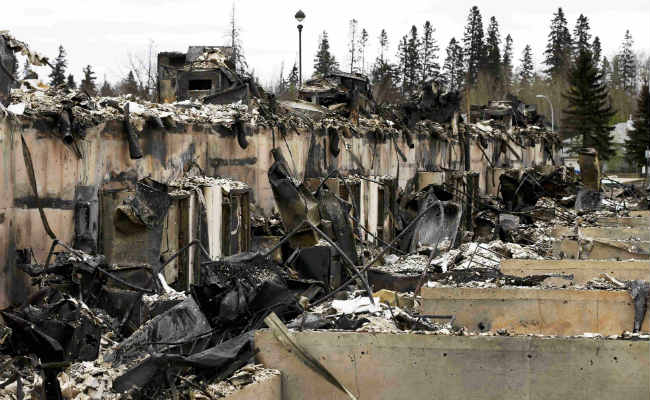 Battle Against Canada Inferno Turns To Oil Sites, Infrastructure