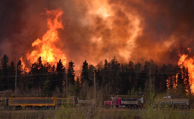 'Nasty' Wildfire Spurs Evacuation Of 88,000 In Canadian City