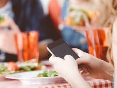 At the Dinner Table: Texting is OK But Not Facebook At the Dinner Table: Texting is OK But Not Facebook