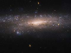 Hubble Space Telescope Spots Rare Hidden Galaxy In Night Sky