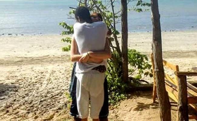 Can You Tell Who's Hugging Whom in This Photo Going Viral?