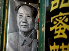 Garbage Picker In Military Attire Sings Mao's Praises