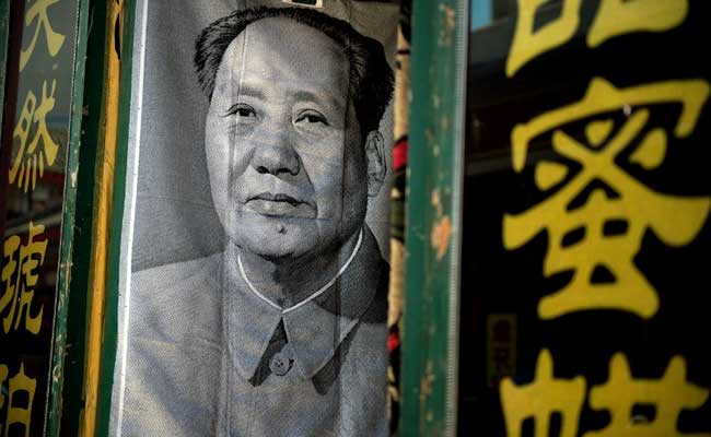 Garbage Picker In Military Attire Sings Mao's Praises